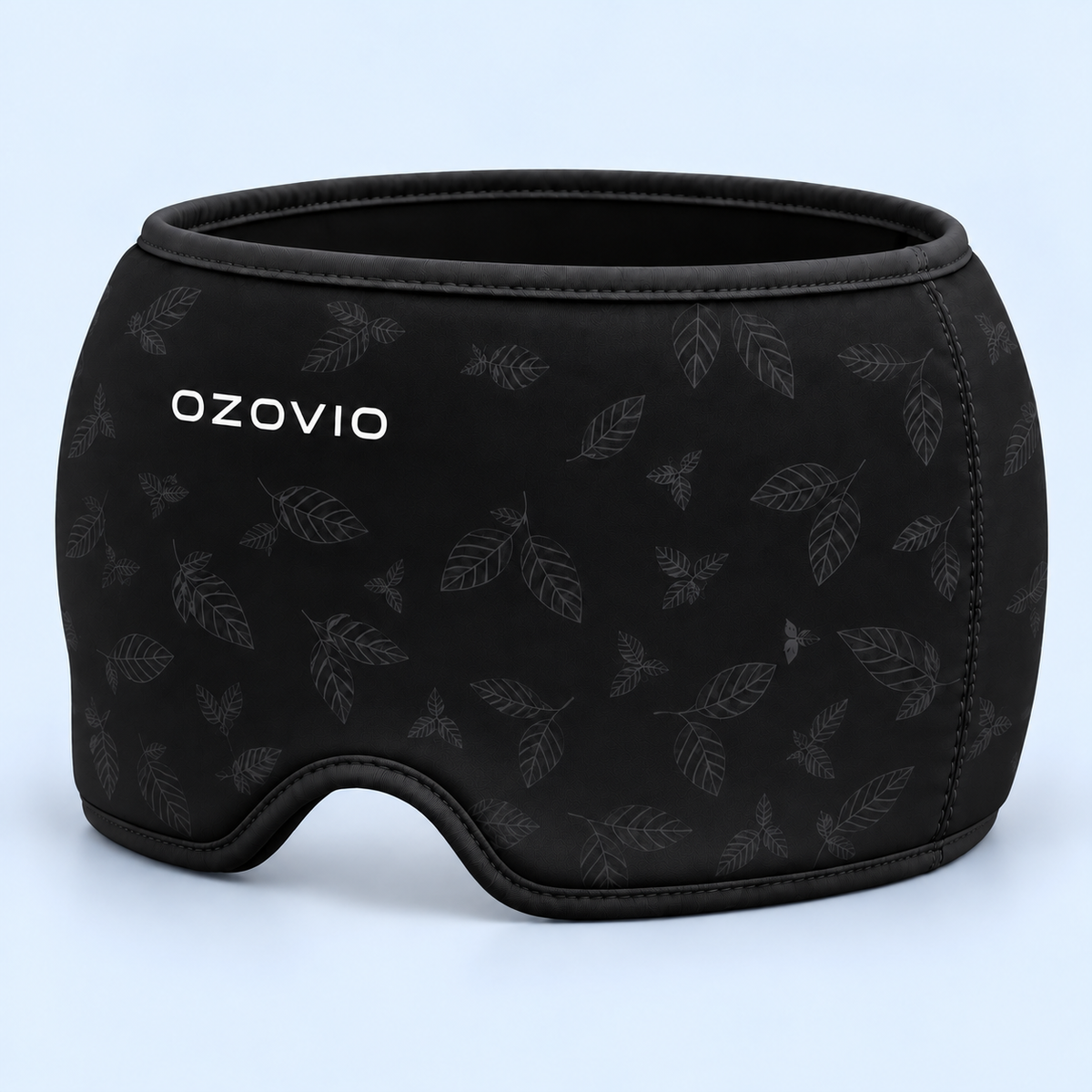 Máscara antimigraña OZOVIO en color negro, con el estampado de hojas en relieve